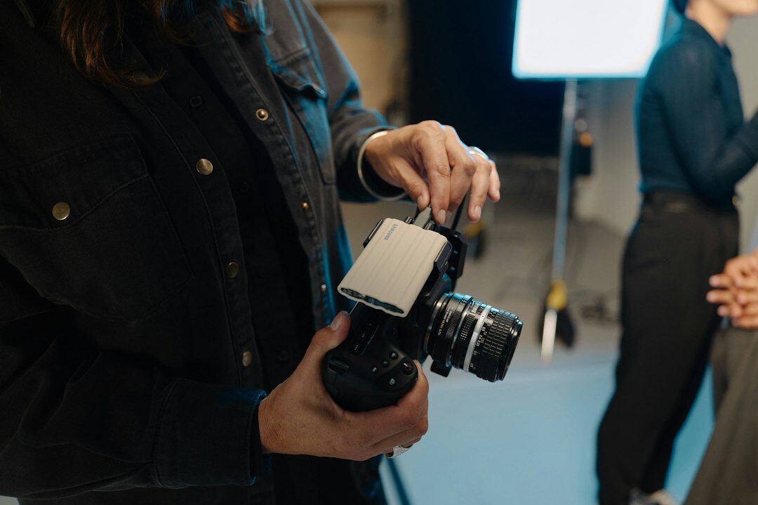 Experienced journalist leading a workshop for a small group of media professionals